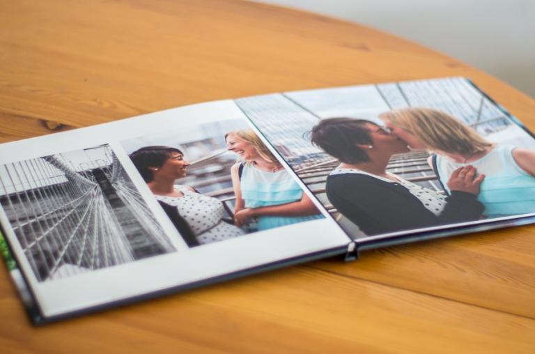 Blue Photoraphy's products: The hinged press-printed album is a lovely (and more affordable) way to share your prized photographs. They're perfect for wedding reception books or parent albums!